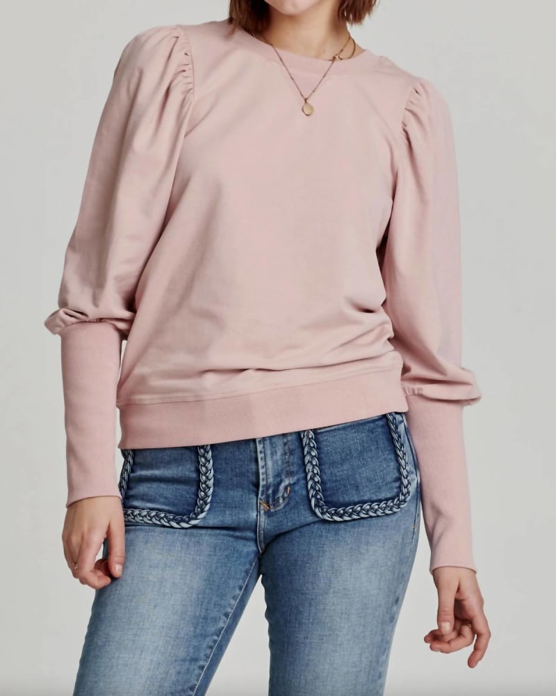 Front of a model wearing a size L Tayna Puff Shoulder Sweatshirt in Pink in Pink by Another Love. | dia_product_style_image_id:340392